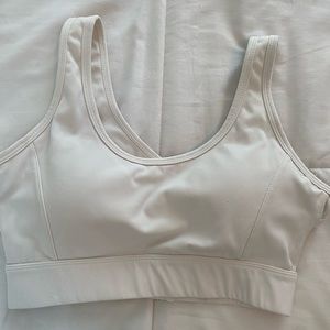 White NVGTN sports bra